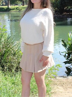 Cozy Cream Knit Sweater with Beige Pleated Skort